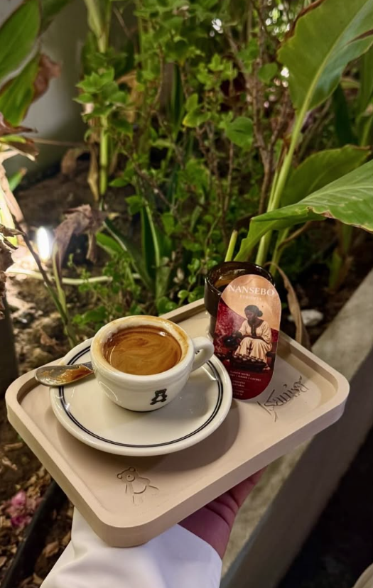Espresso and Nansebo beans on a wooden tray